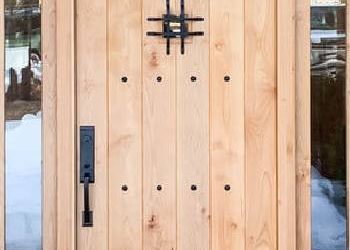 How Can Wood Tone Affect the Visual Weight of a Custom Door?