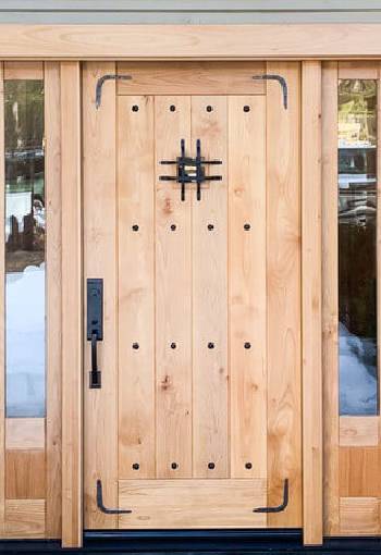 How Can Wood Tone Affect the Visual Weight of a Custom Door?